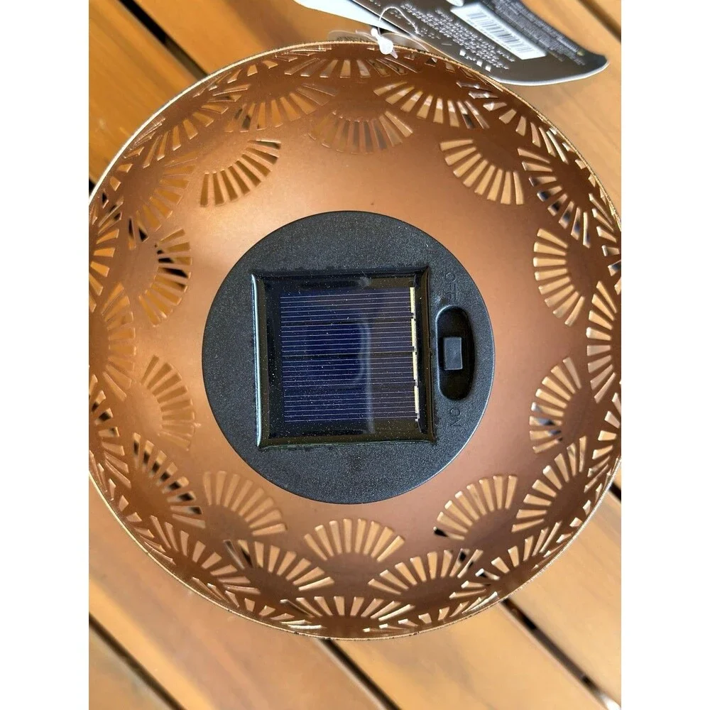 A Home Decor Solar Metal LED Flame Table Lamp Cutout Outdoor Lantern⁠